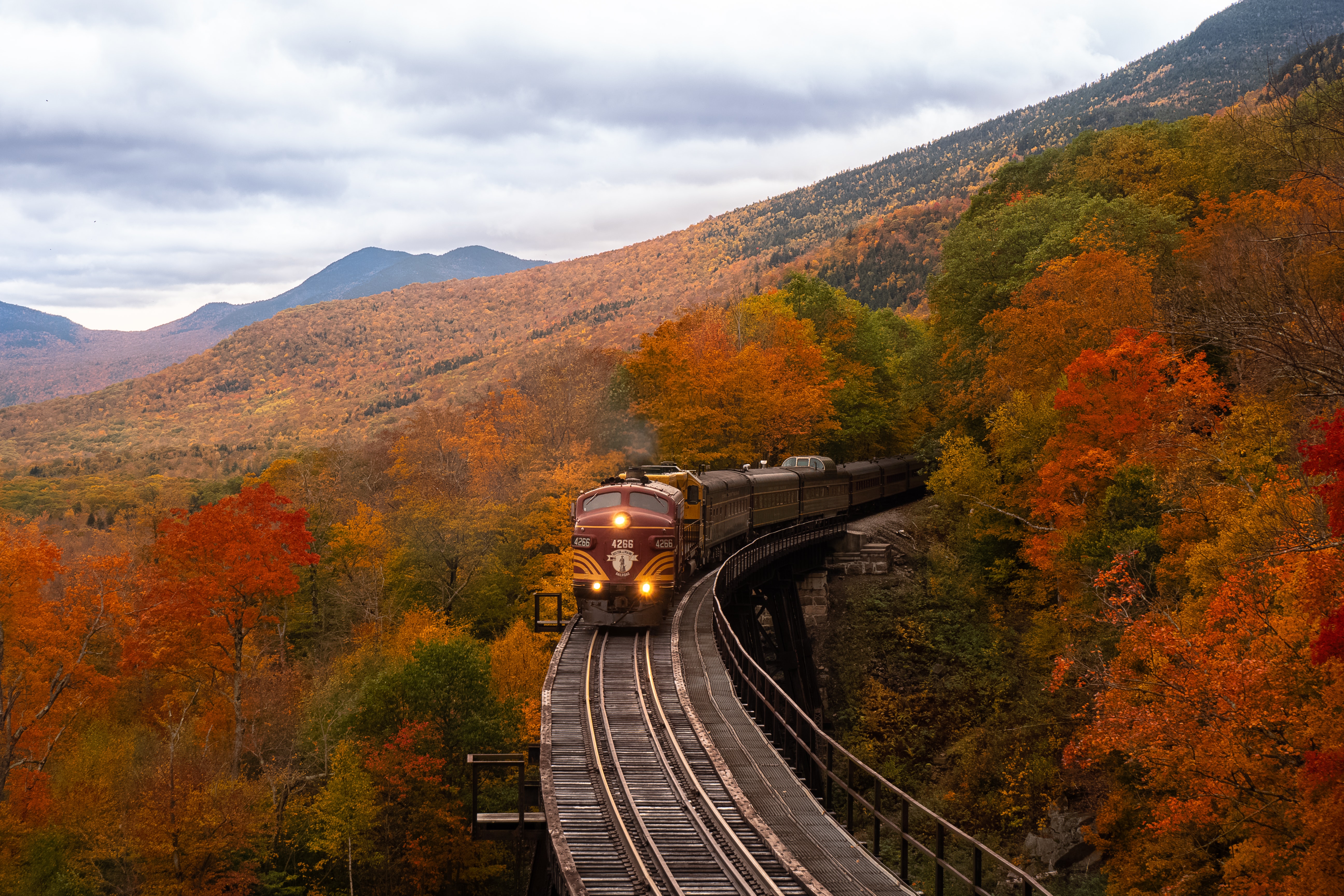 4266 train in the middle of the woods during fall, New Hampshire, USA