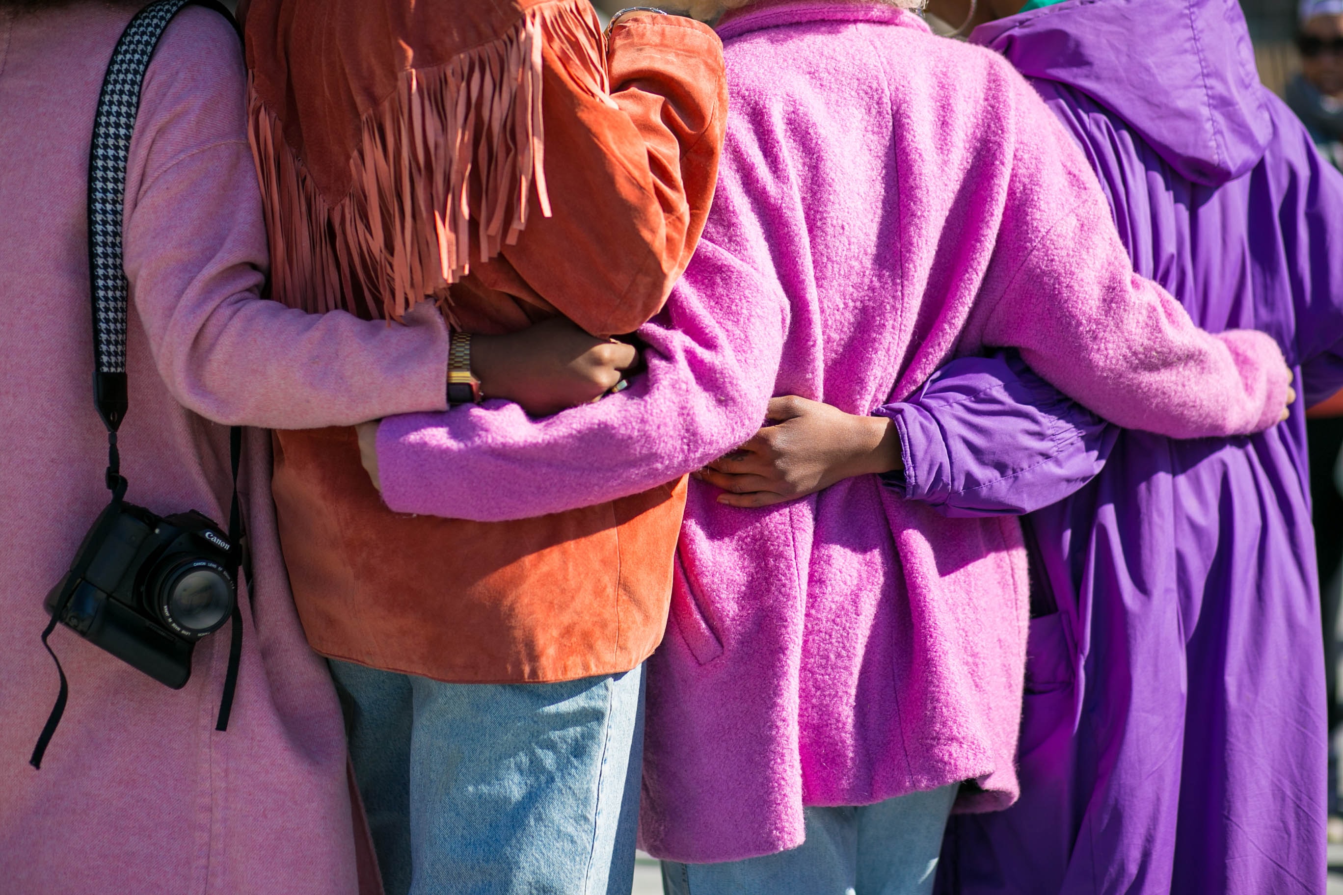 Group of ladies in purple showing how remote work strengthens diversity and inclusion